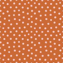 Vector abstract seamless pattern with polka dot ornament made in orange color. Hand drawn fabric design or wallpaper for you design.