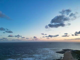 Fototapeta premium Aerial View of Botany Bay Beach and Sea View During Sunset at Broadstairs Kent, England UK. April 21st, 2024