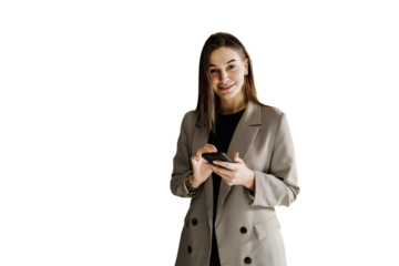 A business woman uses a phone to communicate in a work chat with a client, cut out the background