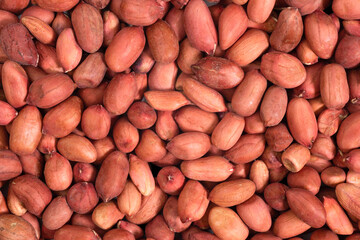 Background of shelled peanuts, top view. Nuts food background