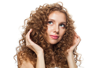 Cheerful woman face. Young model with healthy skin, long hair and makeup on white background