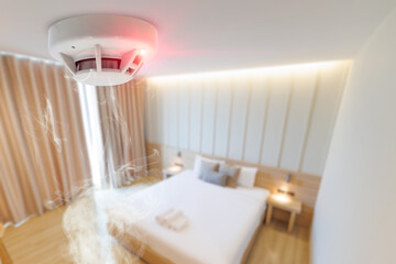 hotel bad room smoke fire detector install at ceiling. fire safety device for home - 792644823