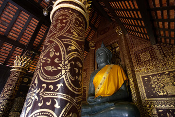 Beautiful black Thai Buddha statues in the temple building are in the old temple pavilion Beautiful...