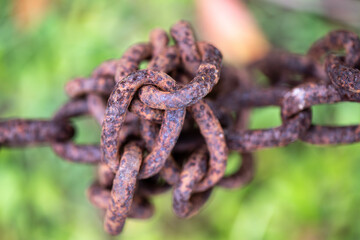 rusty rusted metal chain, links knot, macro close closeup