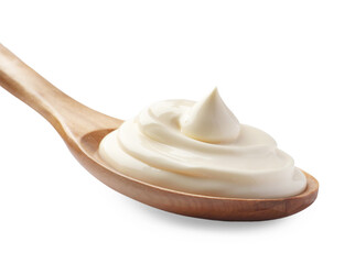 Natural yogurt in wooden spoon isolated on white