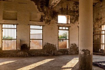 Inside of demolished abandoned mosque in Al Jazirah Al Hamra haunted town in Ras Al Khaimah, United...