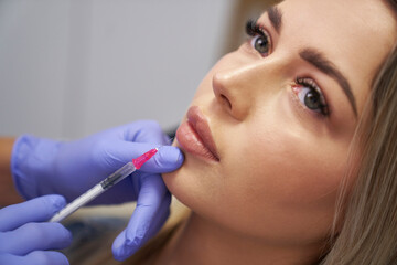 Woman having beauty procedure in beauty salon