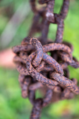 rusty rusted metal chain, links knot, macro closeup close