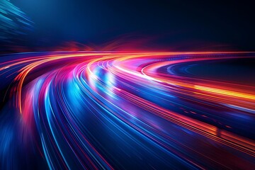 a dynamic image of light trails on a highway at night with vibrant blue and red streaks against a dark backdrop