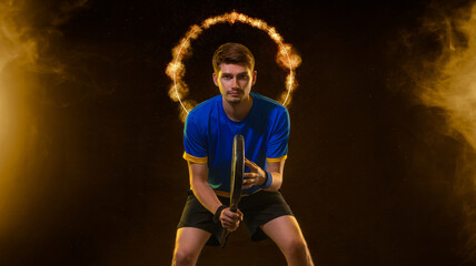 Padel Tennis Player with Racket in Hand. Paddle tenis, on a neon background. Download in high resolution.