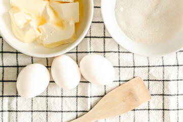 a set of products for making dough. flour, butter, eggs. homemade cakes