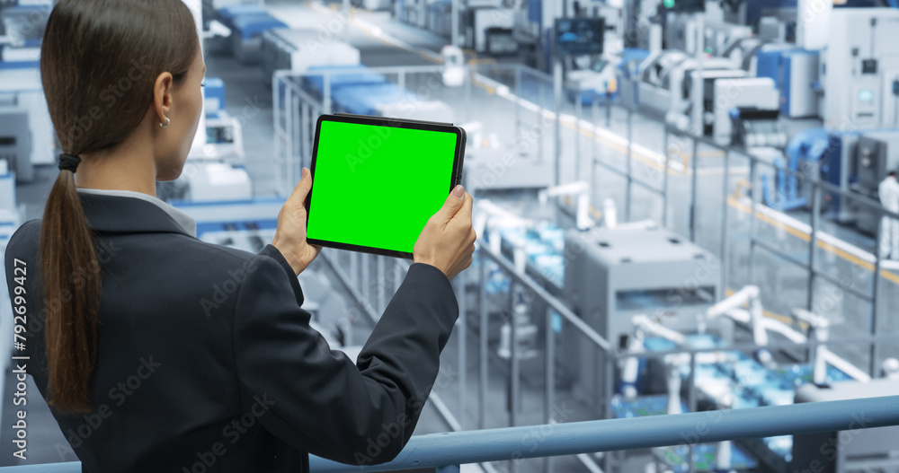 Aufkleber Electronics Manufacturing Project Manager Working on a Tablet Computer with Green Screen Template at a Factory. Female Specialist Developing, Maintaining, Upgrading Programs for Machine Production