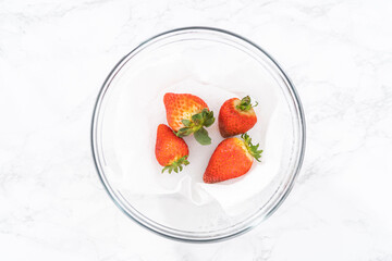 Washed and Dried Strawberries Neatly Stored in a Glass Bowl - 792717208