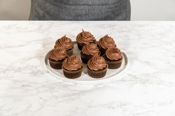 Baking Chocolate Cupcakes with Decadent Chocolate Frosting - 792724253