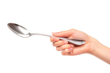 Woman's hand holding a silver spoon isolated on a cutout PNG transparent background