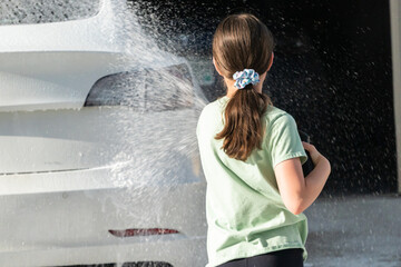 Little Helper Washing the Family Electric Car - 792729855