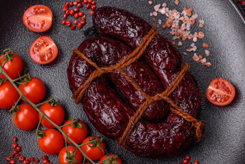 Delicious black blood sausage or black pudding with spices and herbs