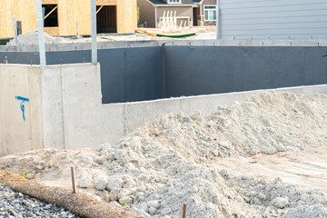 Suburban Single-Family House Construction: Foundation Stage Progress