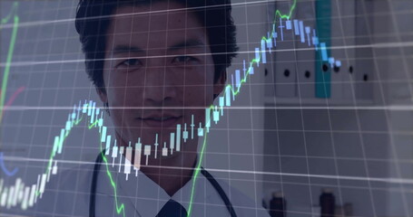 Image of financial data processing over asian male doctor