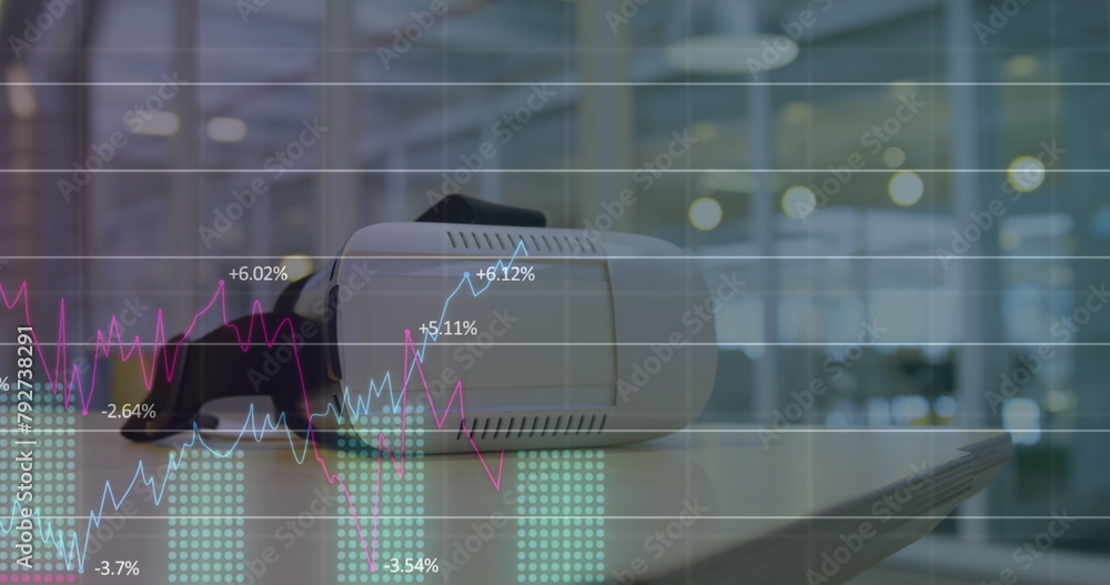 Poster image of graphs and numbers over vr headsets on table