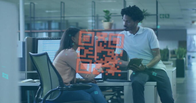 Image of diverse businesspeople in office and qr code - Powered by Adobe