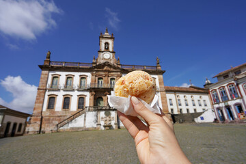 Pao de queijo (Brazilian cheese bun) in Tiradentes Square, Ouro Preto, Minas Gerais, Brazil, the city is World Heritage Site by UNESCO