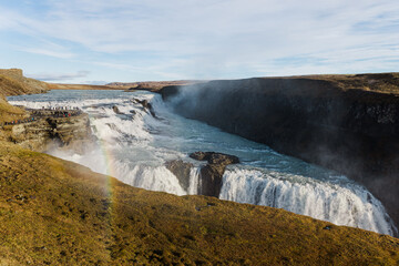Majestic Gullfoss waterfall with rainbow in Iceland