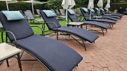 Row of Lounge Chairs on Brick Patio