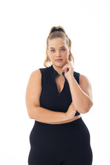 A young Caucasian plus-size model with blonde hair on white background, copy space - 792788877