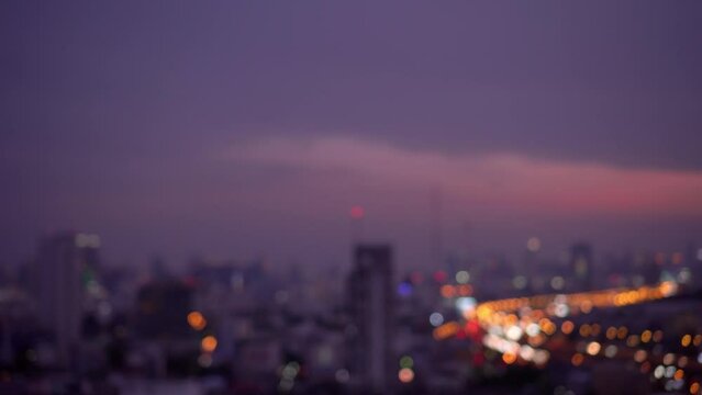 Blurred of city skyscraper and tower lights bokeh in twilight sky , Soft Focus , Metropolis Backgound wallpaper	
