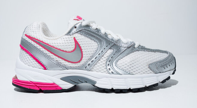 kent,uk 01.01.2023 Nike Women Air Skyraider 2 Womens jogging exercise Shoes. modern and stylish Athletics and marathon equipment. White and pink trainers.