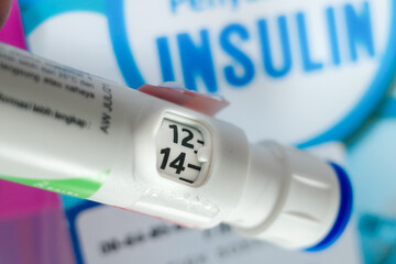 Pen like insulin injection showing amount of dosage