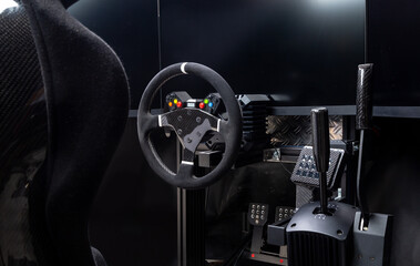 DIY high end simracing aluminum carbon fiber simulator rig for video game sim racing. Black CFK car...