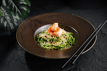 Gourmet asian shrimp salad on elegant plate