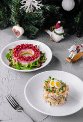 Festive holiday salad and olivier on christmas table