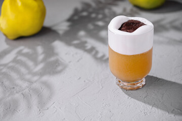 Refreshing whipped cocktail with citrus shadow