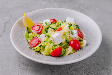 Fresh greek salad with feta cheese and vegetables