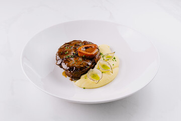 Fototapeta na wymiar Gourmet steak with mashed potatoes on elegant plate