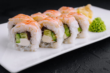 Fresh sushi roll platter on elegant white dish