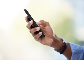 Hand, typing and person contact with phone for business, feedback and investor chat to client. Professional, businessman and research stocks or trading with smartphone and reading financial news