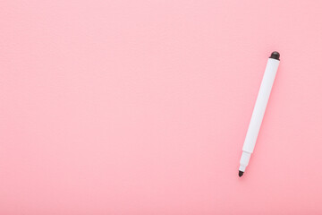 Black white color pen on light pink table background. Pastel color. Closeup. Empty place for text. Top down view. - 792819491