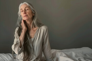 lady with long gray hair waking up