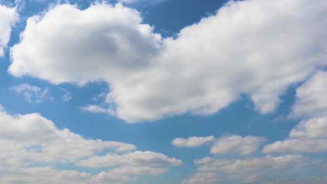 Blue Sky and clouds fast Timelapse. Timelapse videos, sun shines through the clouds on the sky