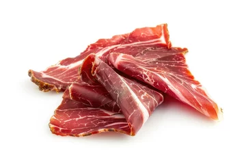 Foto op Canvas Iberico Ham - Delicious Raw Cured Meat Isolated for Epicurean Deli Experience © Serhii