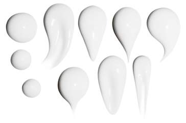 A set of smears of cosmetic cream on a blank background.
