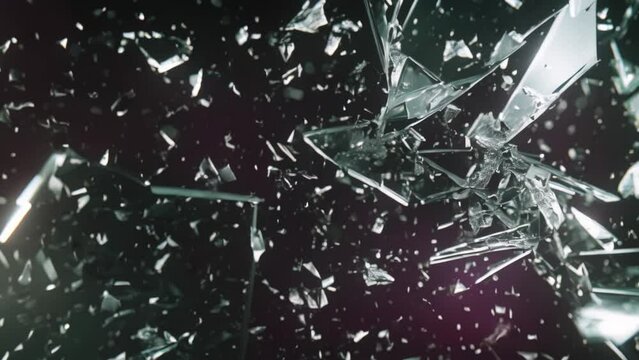 Broken glass on dark background with hole, close up video
