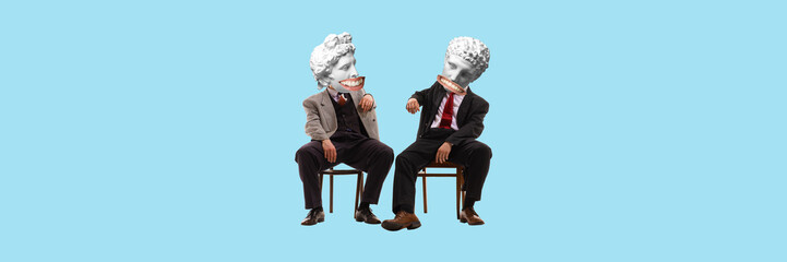 Two men in a suit with antique statue bust sitting on chair and talking. Contemporary art. Friends and team mates conversation. Concept of creativity, retro and vintage style, imagination, surrealism