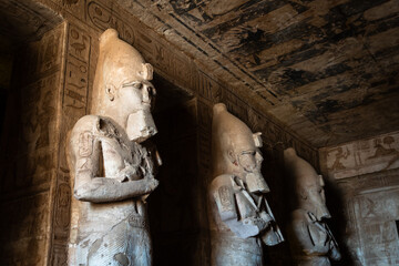 Abu Simbel, Egypt - November 28 2023: Giant statues of Ramses II inside the famous Abu Simbel temple that lies south of Aswan in the Nubian region of upper Egypt. - obrazy, fototapety, plakaty