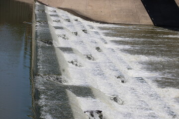 A side view of thespillway below White Rock Dam and the greater spillway into the tidal pool where...