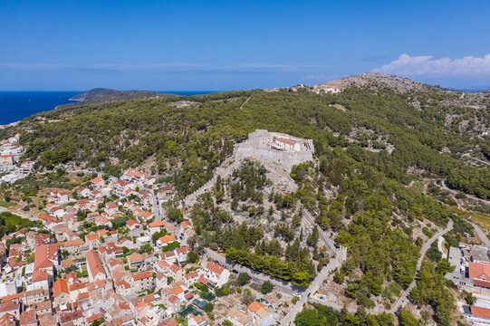 Hvar, Croatia: Aerial view of the Spannish fortress overlooking the medeival Hvar old town in Croatia on a sunny summer day